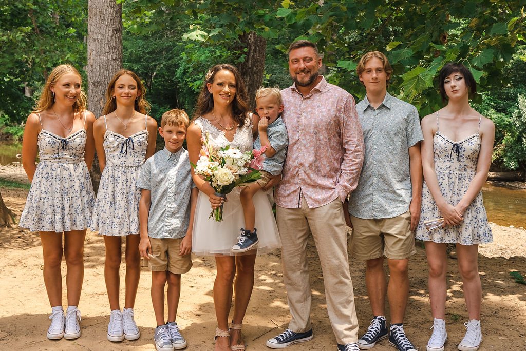 A wedding party gathered on the grounds